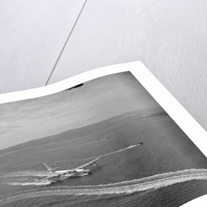 Howard Hughes' Spruce Goose Taxiing Across Water by Anonymous