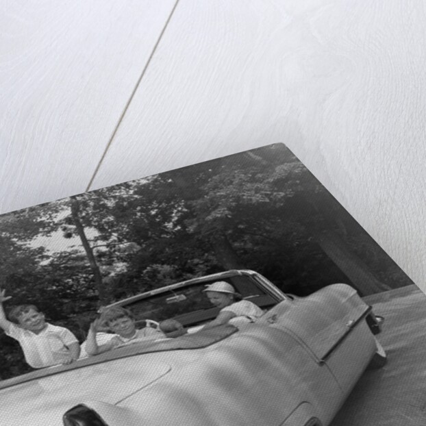 Family In Car by Anonymous