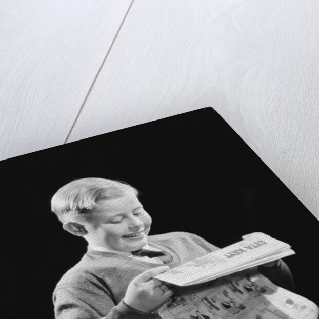 Boy Reading Comics by Anonymous