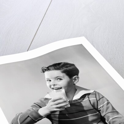 Smiling Boy with a Glass of Milk by Anonymous