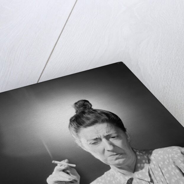 Woman with Top Knot Smoking by Anonymous