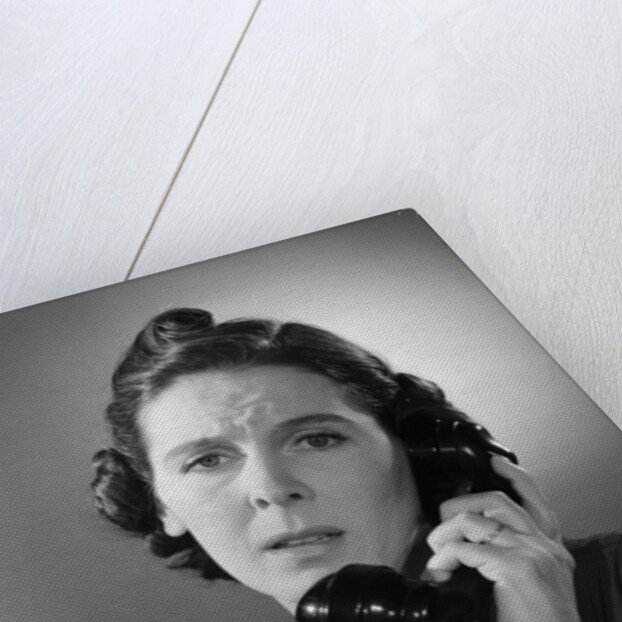 Anxious Woman On The Telephone by Anonymous