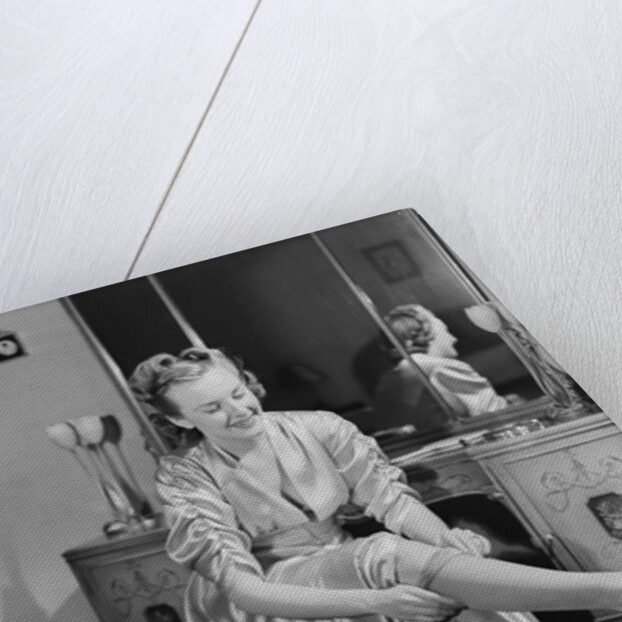 Woman Putting On Stockings by Anonymous