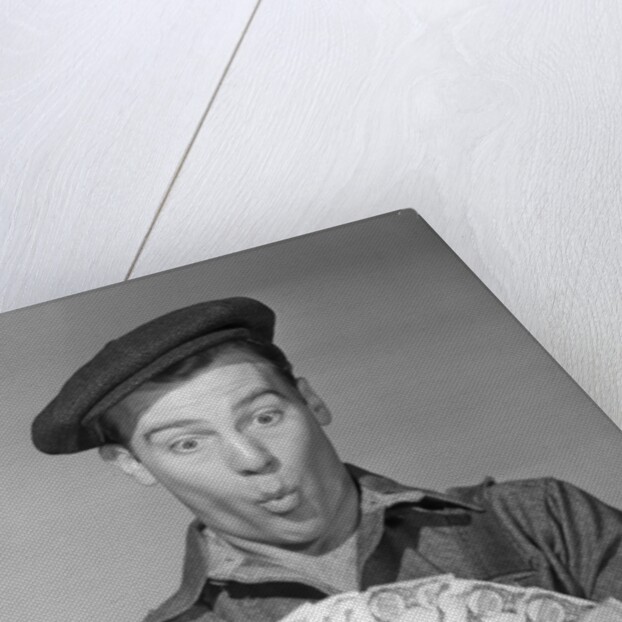 Man Holding Fan of Money by Anonymous