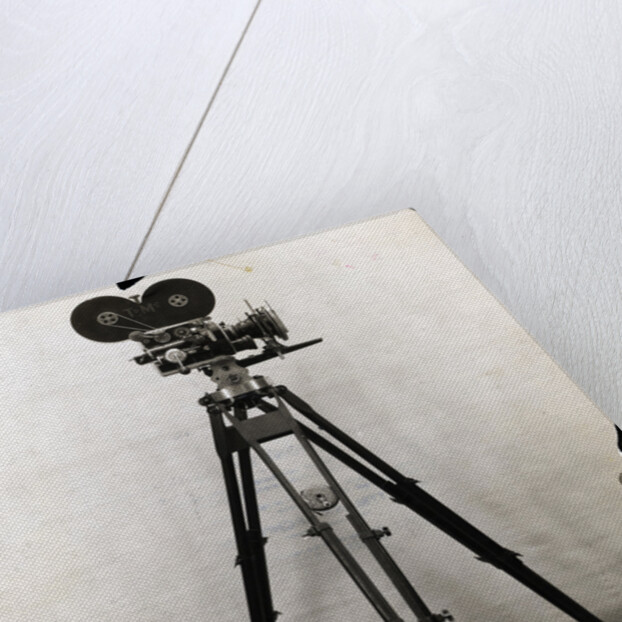 Early Movie Camera on Tripod by Anonymous