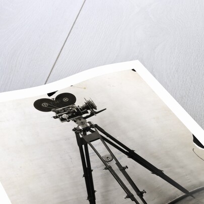 Early Movie Camera on Tripod by Anonymous