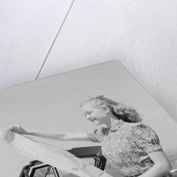 Young Woman Reading Road Map by Anonymous