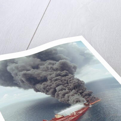 Dark Smoke Rising from Burning Mega Borg Oil Tanker by Anonymous