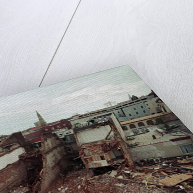 Destroyed Buildings Overflow Alleys by Anonymous