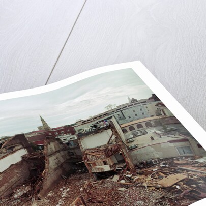 Destroyed Buildings Overflow Alleys by Anonymous