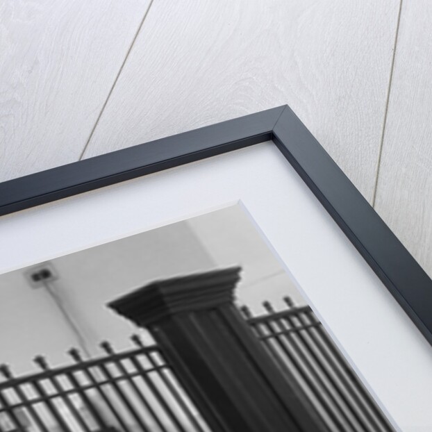 Iron-Grilled Mortgage Window by Anonymous