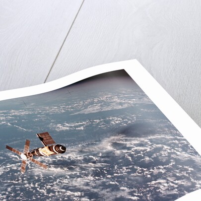 Skylab Space Station in Orbit Over Earth by Anonymous