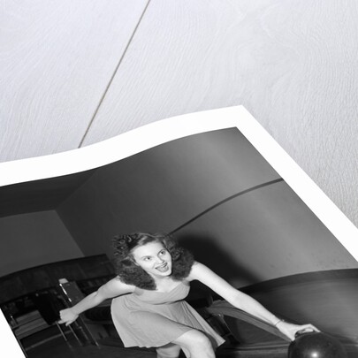 Young Woman Bowling by Anonymous