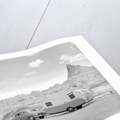 Automobile & Trailer On Badlands Highway by Anonymous