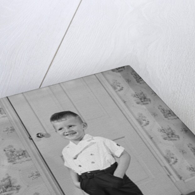 Boy Standing in Oversized Shoes by Anonymous