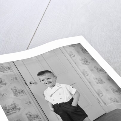 Boy Standing in Oversized Shoes by Anonymous