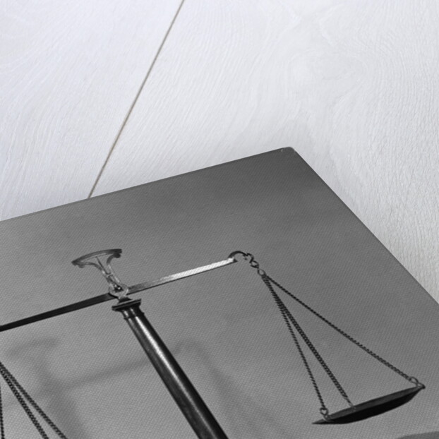 Balancing Scales On Table by Anonymous