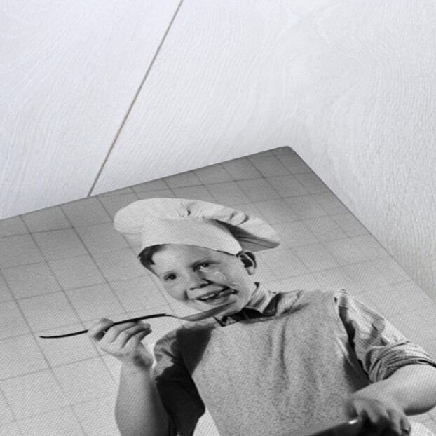 Boy Tasting His Cooking by Anonymous