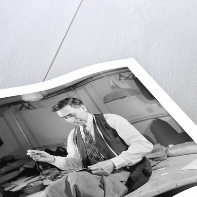 Tailor Sewing a Jacket by Anonymous