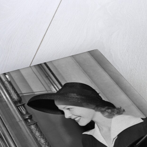 Young Woman At Bank Teller'S Window by Anonymous