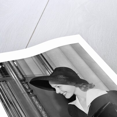 Young Woman At Bank Teller'S Window by Anonymous