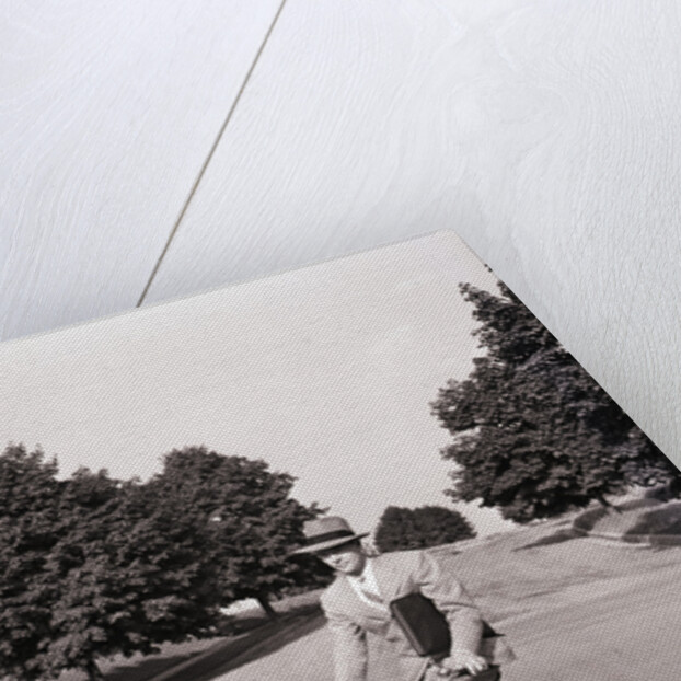 Businessman Riding a Bicycle by Anonymous