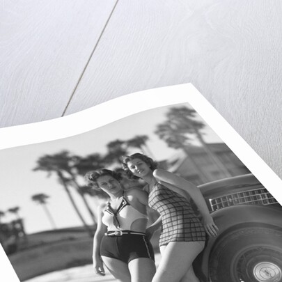Women in Bathing Suits Leaning Against Car by Anonymous
