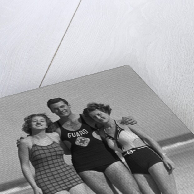 Lifeguard With Arm Around Sunbathers by Anonymous