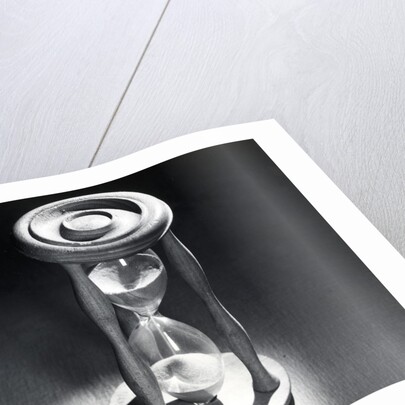 Sand Running Through Hourglass by Anonymous
