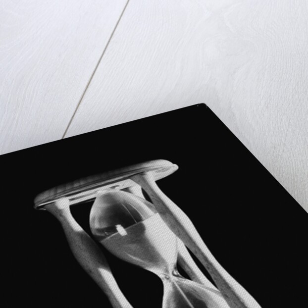 Sand Running Through Hourglass by Anonymous