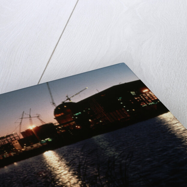 Nuclear Plant Silhouetted Against Sunset by Anonymous