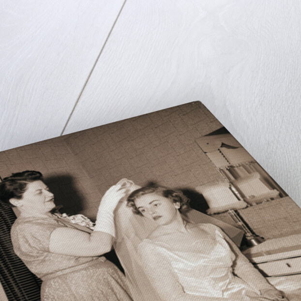 Mother Putting Bridal Veil on Daughter by Anonymous