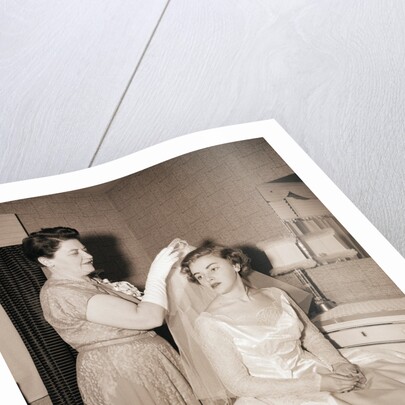 Mother Putting Bridal Veil on Daughter by Anonymous