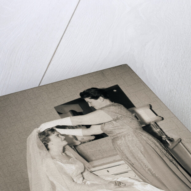 Mother Putting Bridal Veil on Daughter by Anonymous