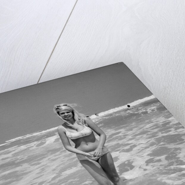 Woman Standing in Ocean Surf by Anonymous