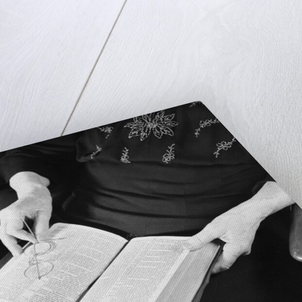 Bible in Woman's Lap by Anonymous