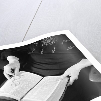 Bible in Woman's Lap by Anonymous