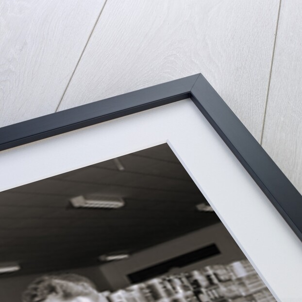 Woman Buying Food In Grocery Store by Anonymous
