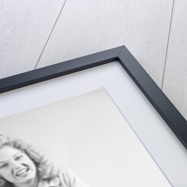Woman Seated on Desk by Anonymous