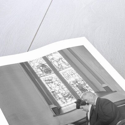 Couple Seated in Church Pew by Anonymous