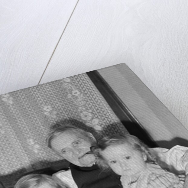 Two Girls on Grandfather's Lap by Anonymous