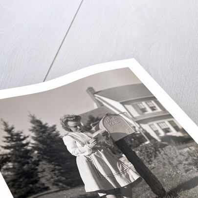 Woman Reading Mail by Mail Box by Anonymous