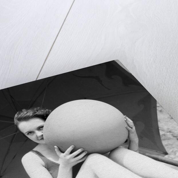 Woman in Bathing Suit Holding Beach Ball by Anonymous