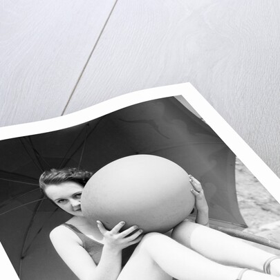 Woman in Bathing Suit Holding Beach Ball by Anonymous