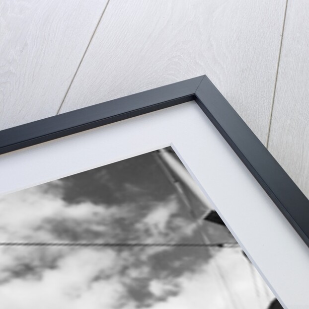 Woman Sitting on Ship Railing by Anonymous