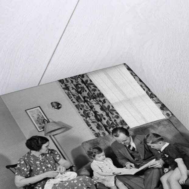 Family Sitting in Living Room by Anonymous
