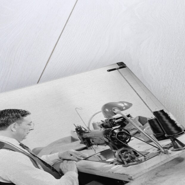 Tailor Working at Sewing Machine by Anonymous