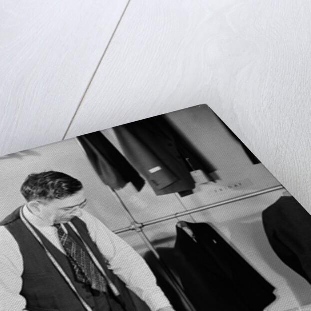 Tailor Cutting Fabric by Anonymous