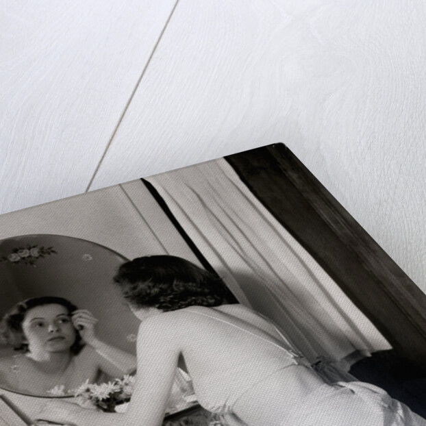 Woman Seated at Vanity by Anonymous