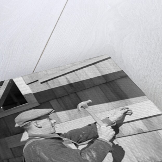 Carpenter Hammering by Anonymous